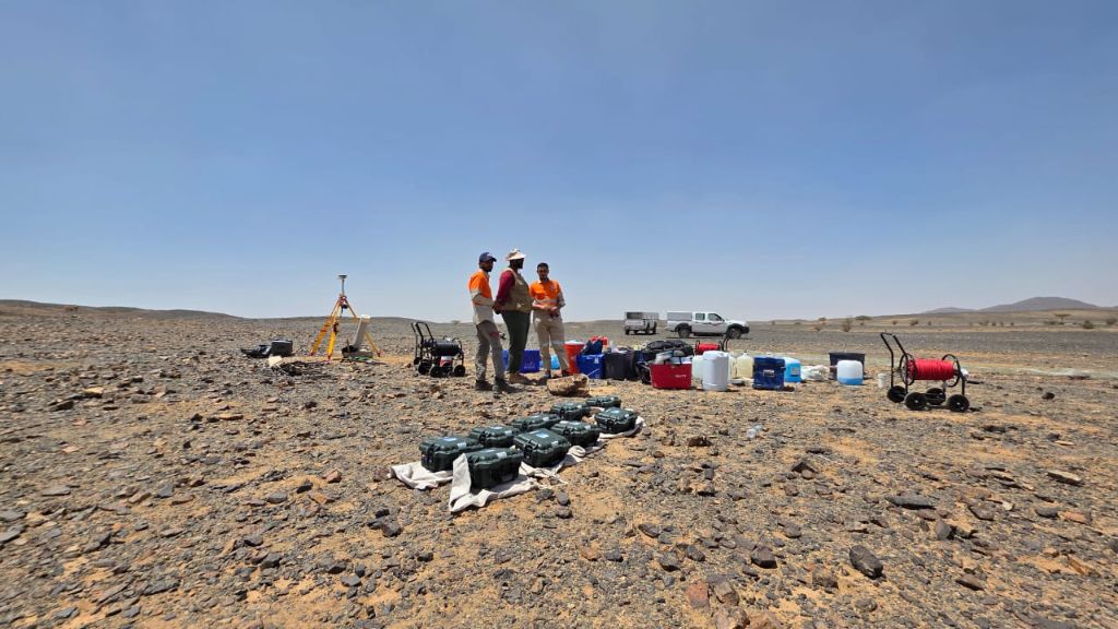 National Rocks field team with survey equipment in desert