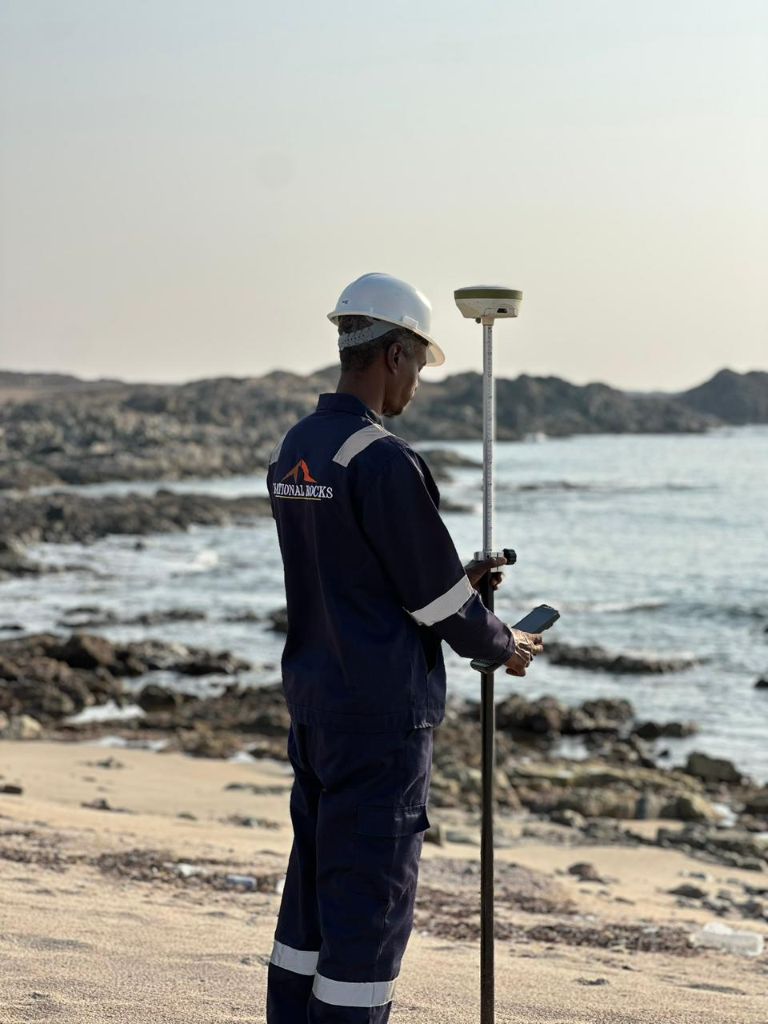 National Rocks GNSS surveyor on coastal rocky site